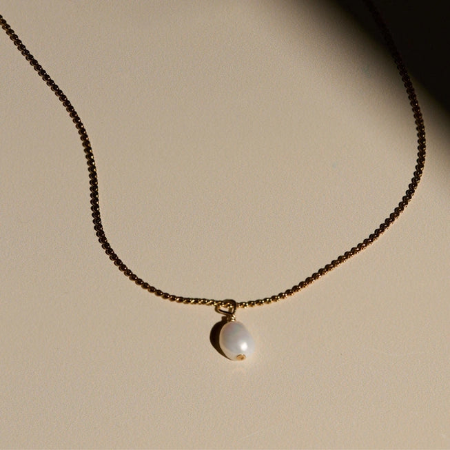 Pearl Droplet Necklace in Gold by A Weathered Penny