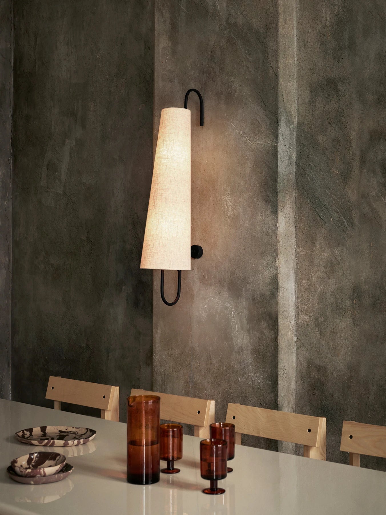 Acona Wall Lamp in situ with a table by ferm Living at Lifestory