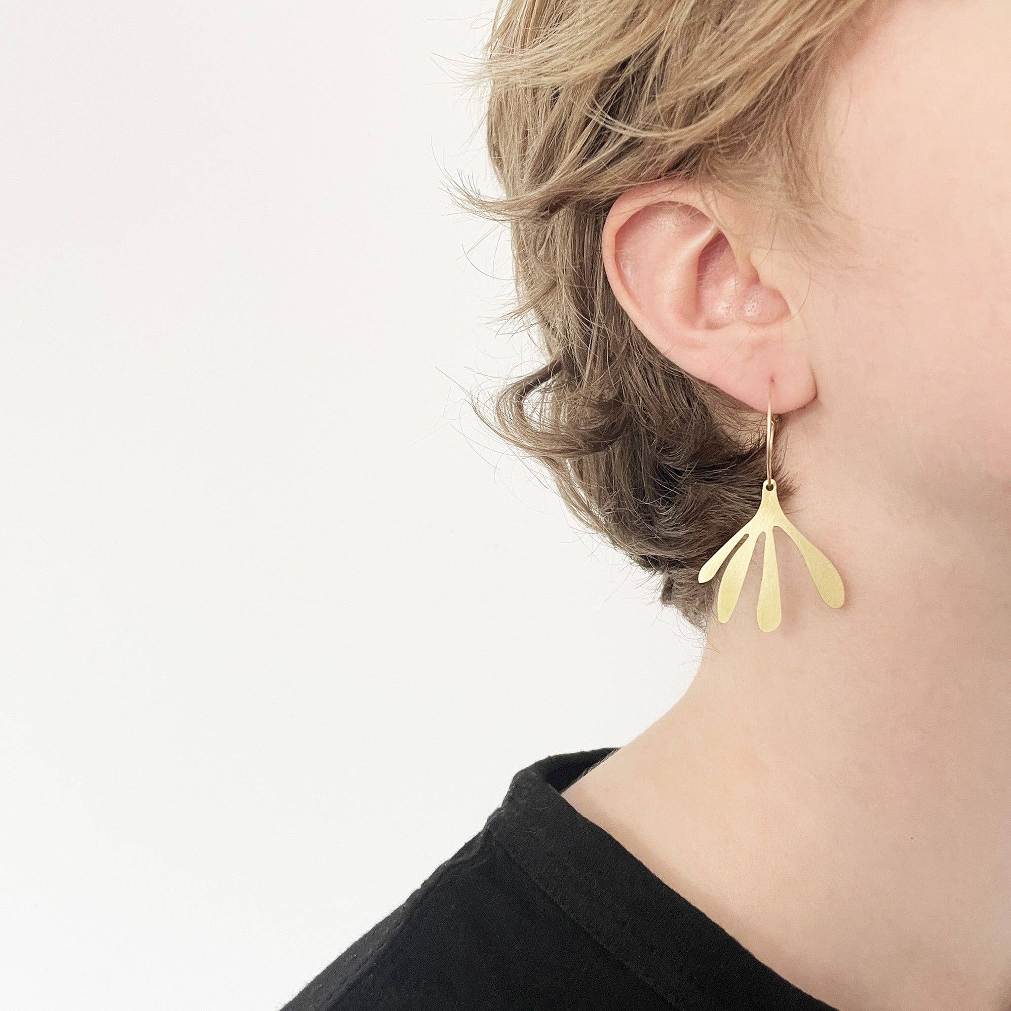 Brass Arame Earrings on a model by Tom Pigeon | Lifestory