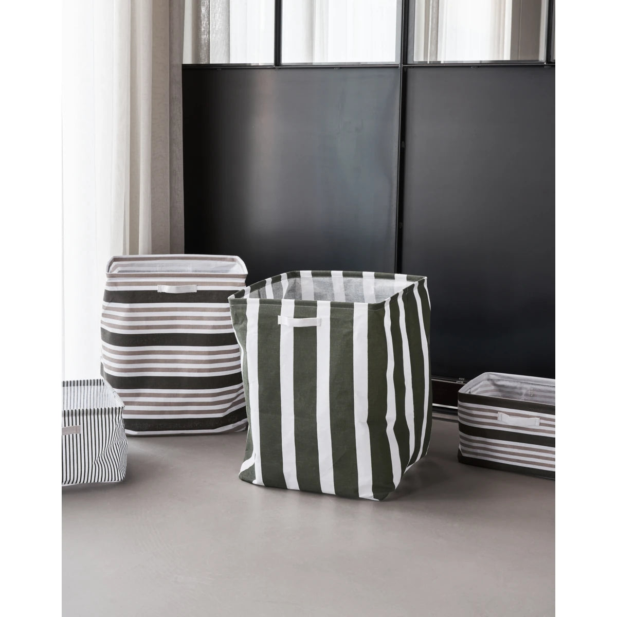 House Doctor Green Striped Fabric 'Store' Basket in context with other baskets