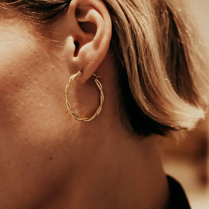 Gold Large Entwined Hoop Earrings on models ear  by Nordic Muse at Lifestory