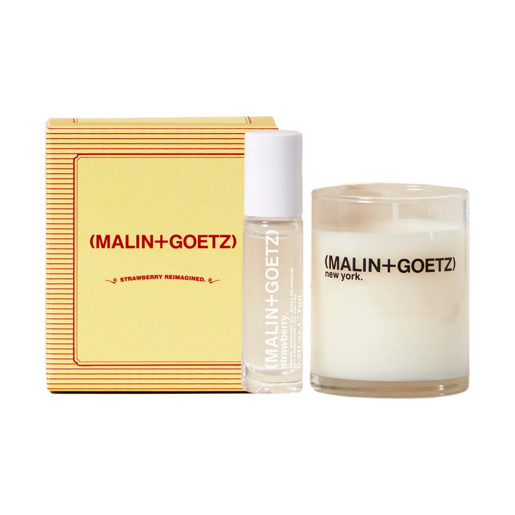 Malin and Goetz Strawberry Reimagined gift set including perfume roll on and votive candle on a white background