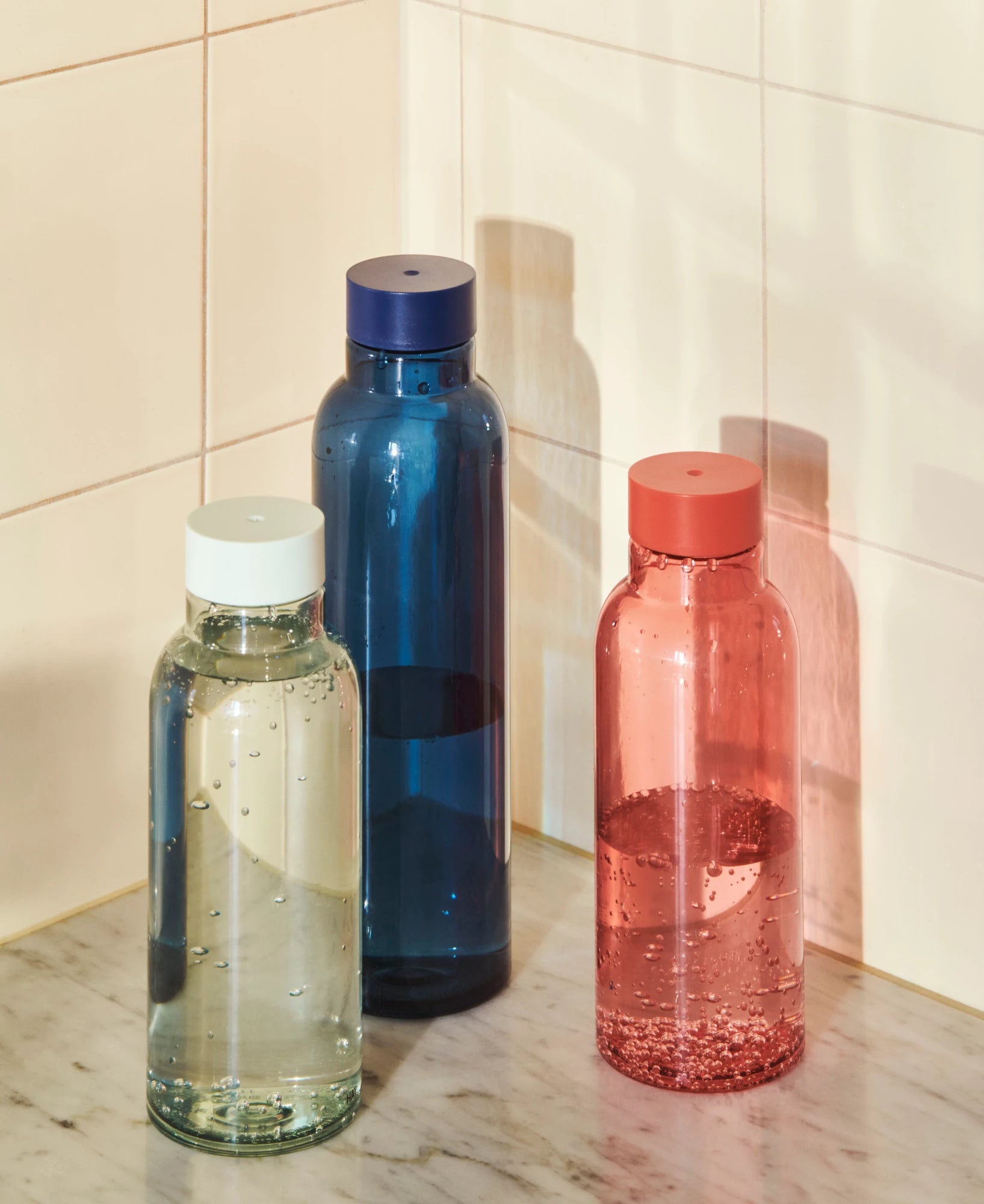 Miz Water Bottles by HAY on a counter top | Lifestory