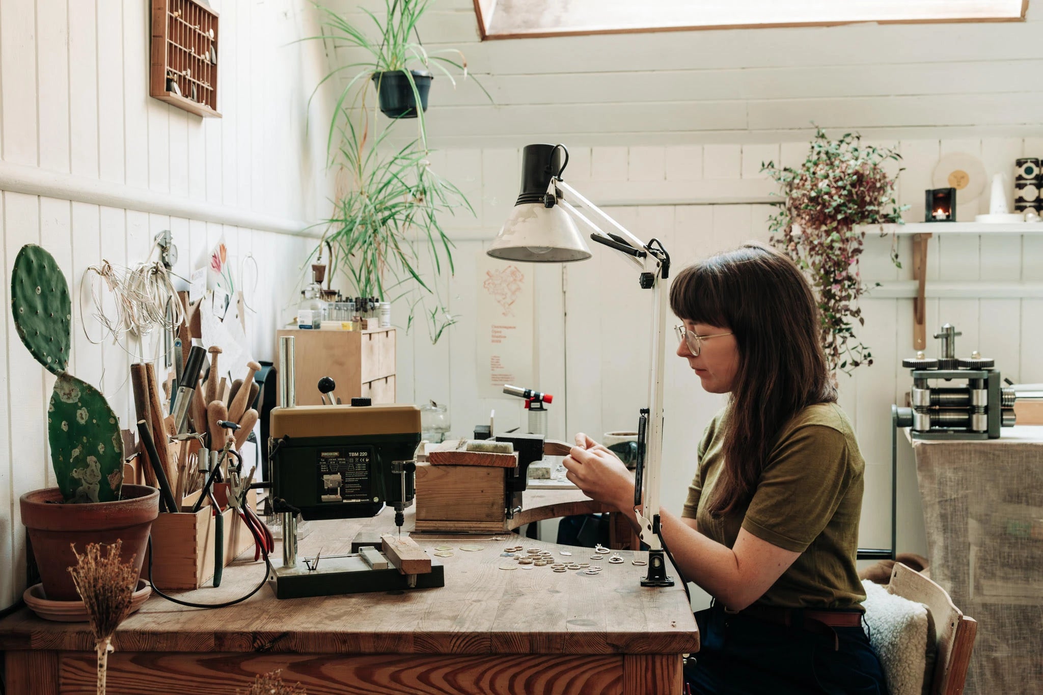 Polly Collins at her work bench