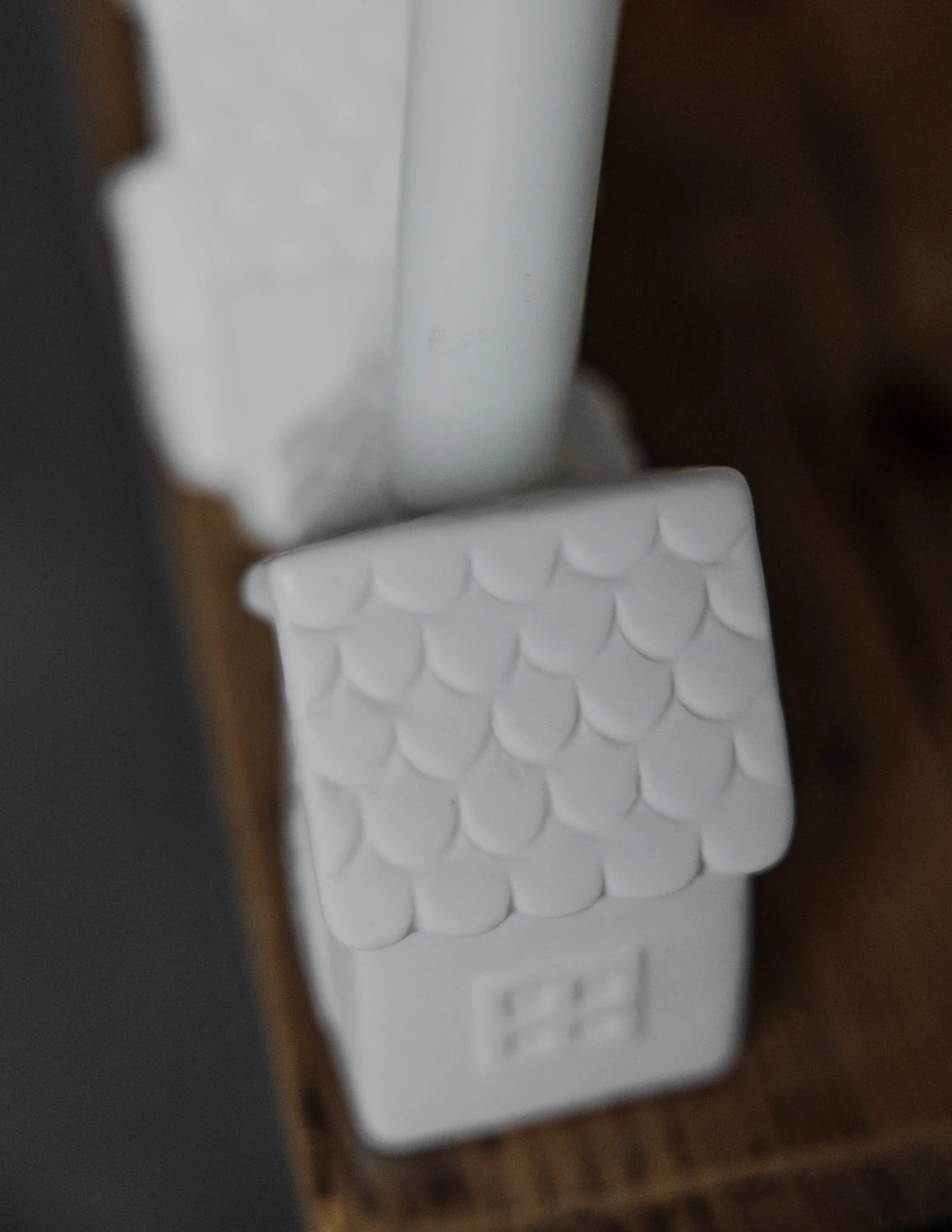 White Ceramic Candle Holder - Ljusstaden Nr 2 by Storefactory on a table top | Lifestory