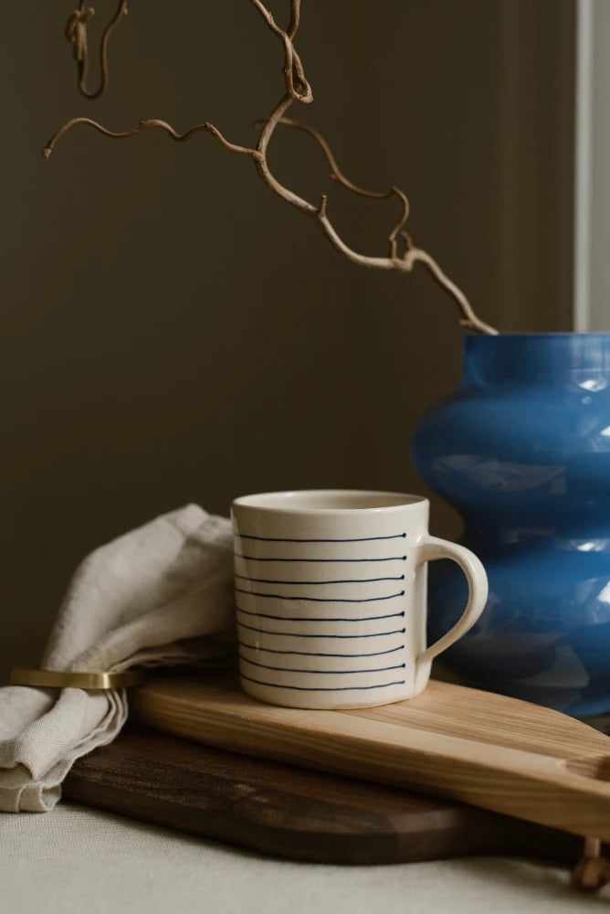 Striped mug, chopping board, glass vase and napking ring by The Conran Shop - Lifestory